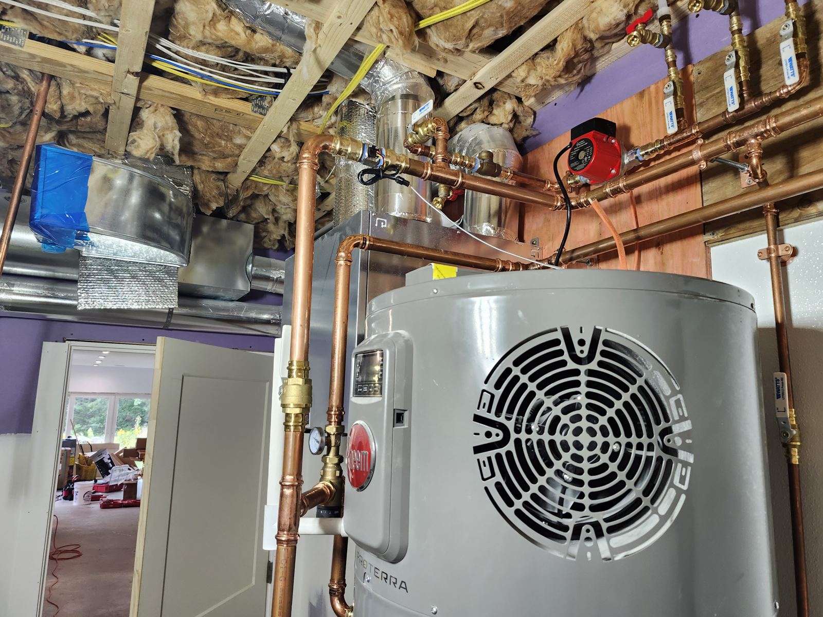 Rheem hybrid heat pump water heater with copper piping and mixing valve